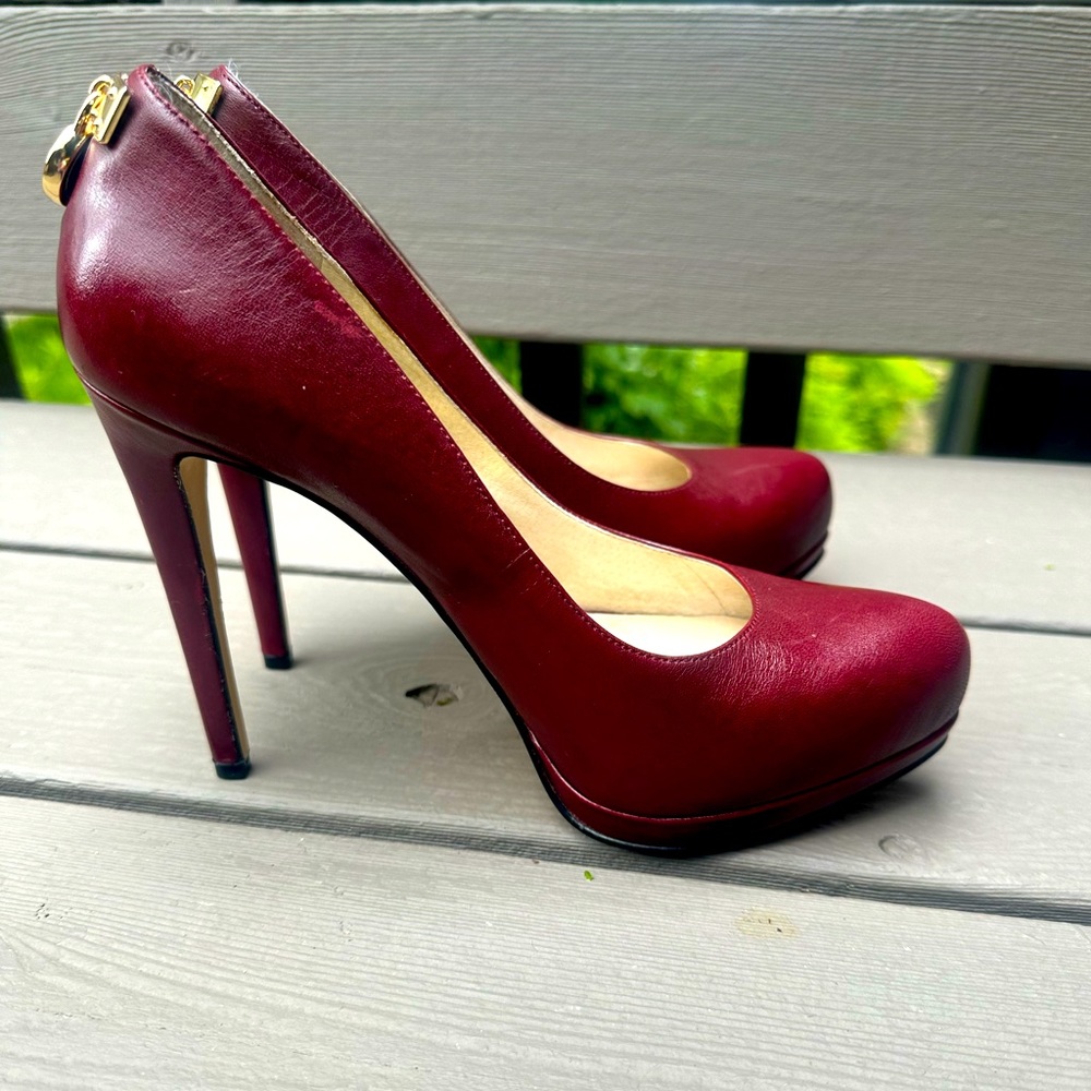 Maroon Michael Kors leather platform pumps